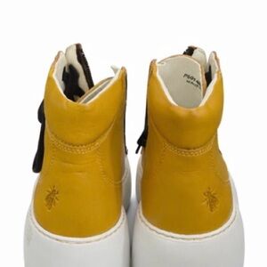Yellow and White High-Top Shoes